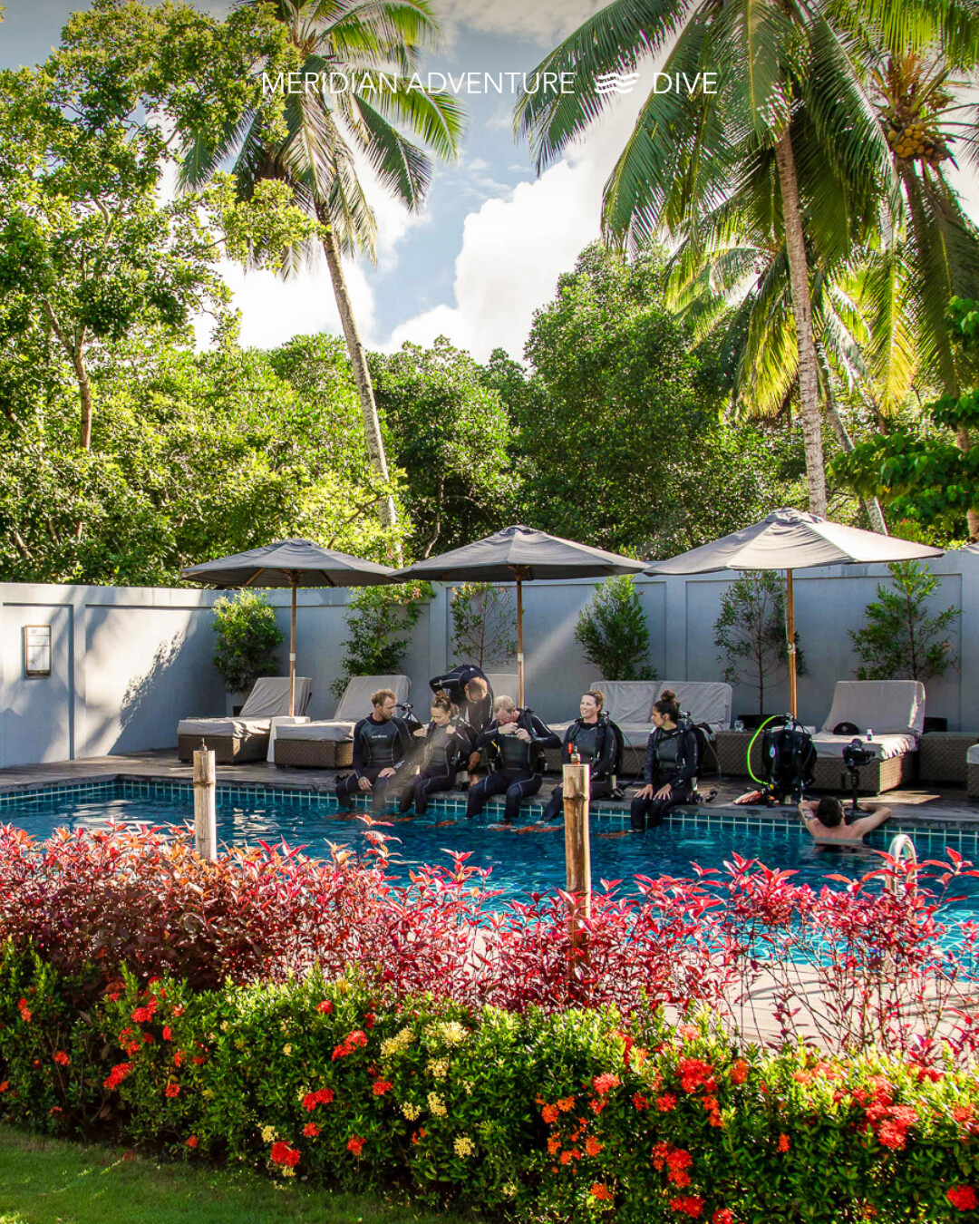 Meridian Adventure Dive Resort facilities in Raja Ampat — IDC candidates relaxing between training sessions