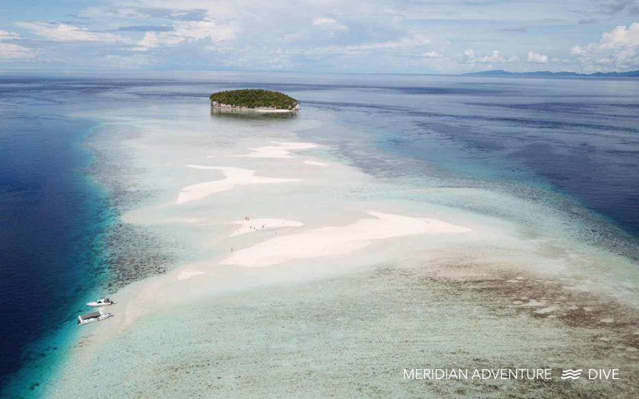 Pasir Timbul sandbank in Raja Ampat at low tide during island hopping