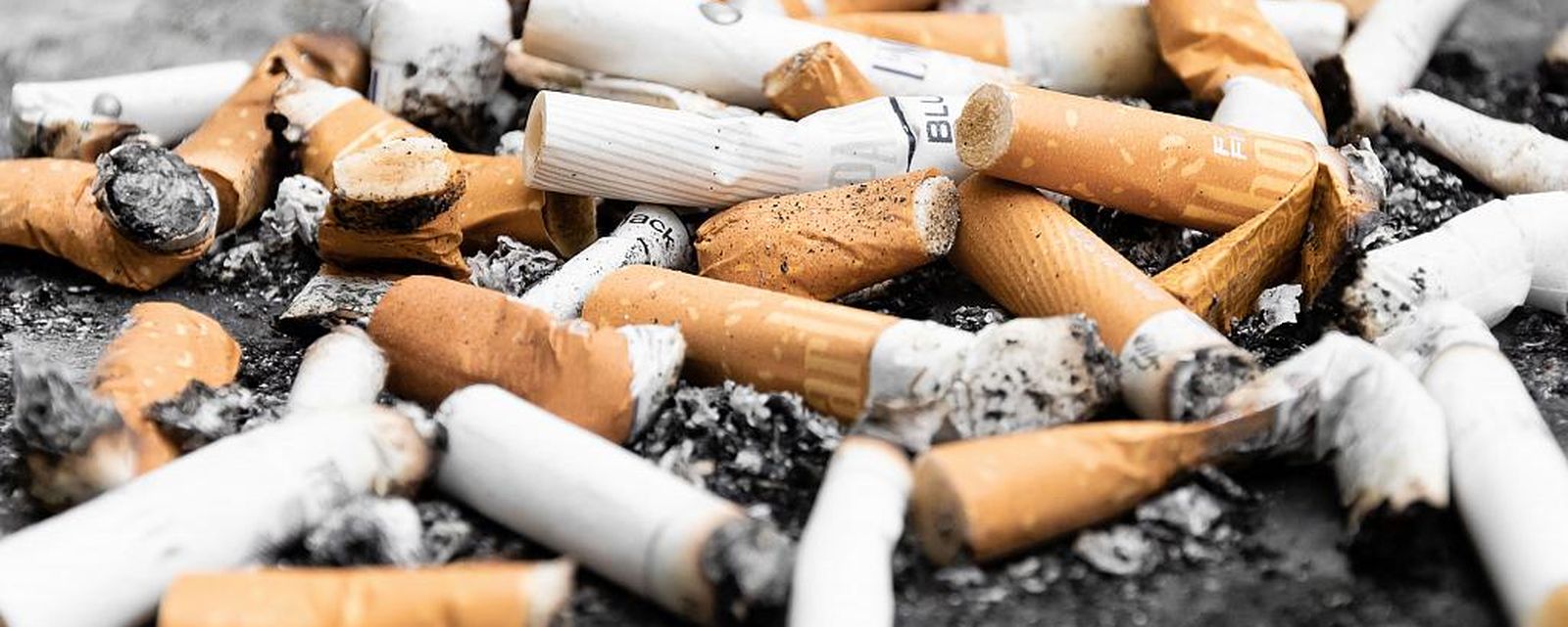 Plastic Free July cigarettes awareness showing cigarette butts as plastic pollution