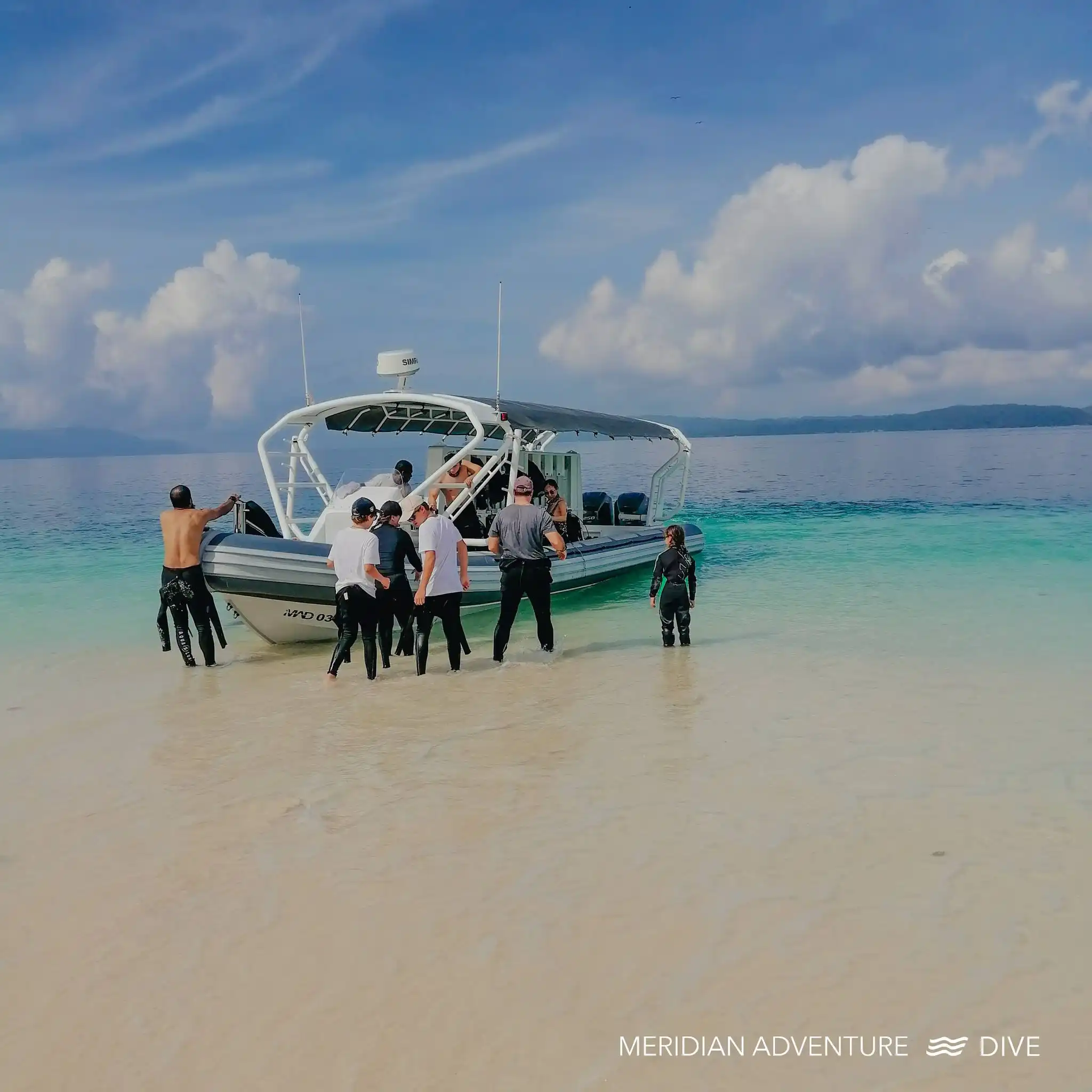 Meridian Adventure dive boat at Pasir Timbul sandbank in Raja Ampat