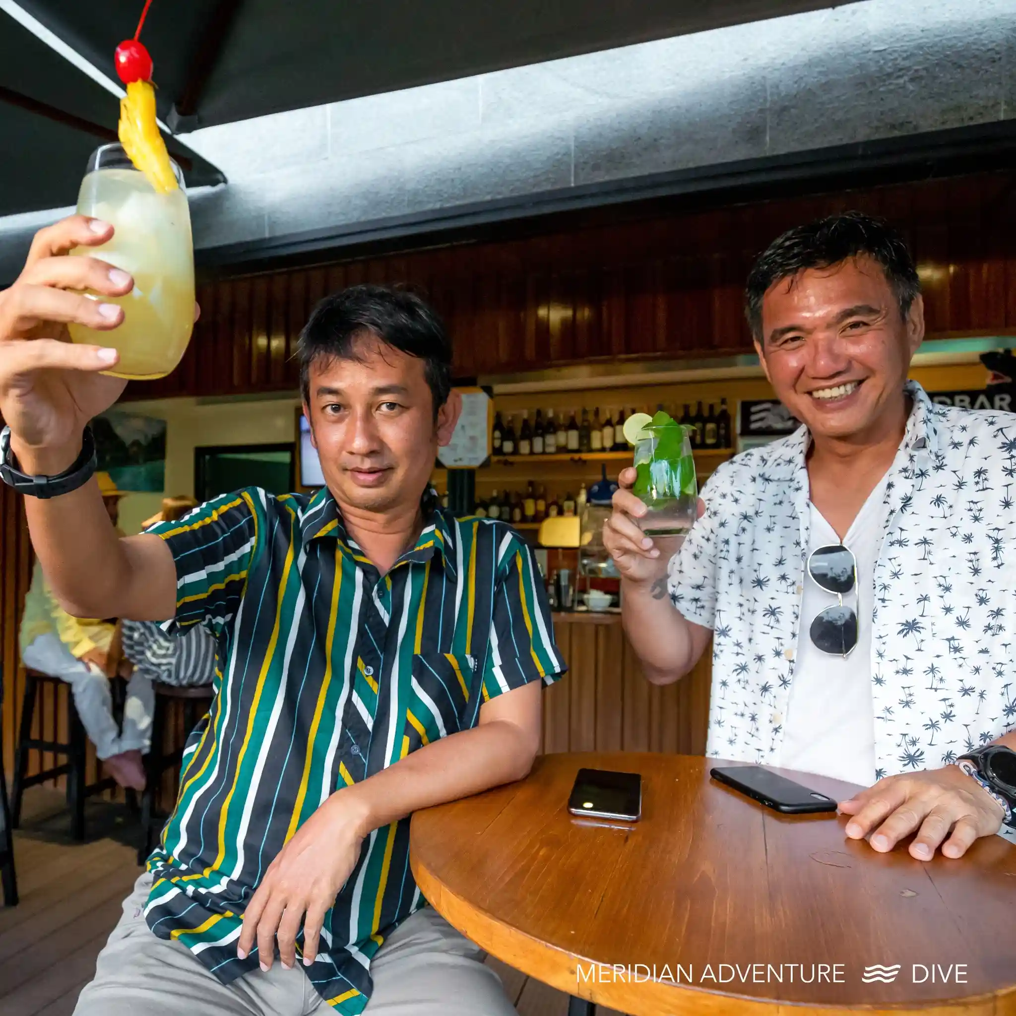 Scuba diving buddy sharing underwater discoveries and dive experiences